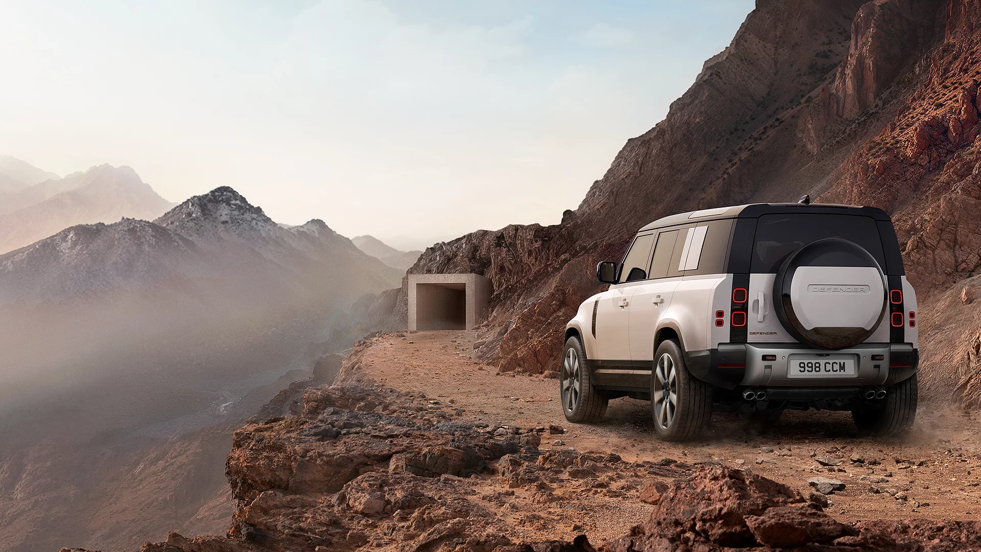 Land Rover Defender on a mountain road
